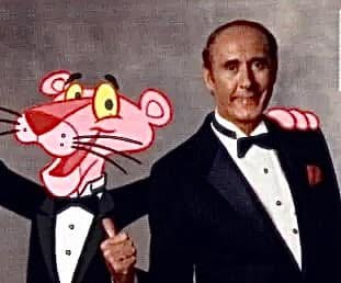 Henry Mancini in black tie beside the Pink Panther