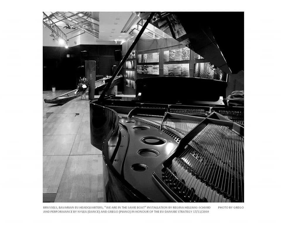 Grand piano and Danube photographs, Bavarian EU headquarters, Brussels